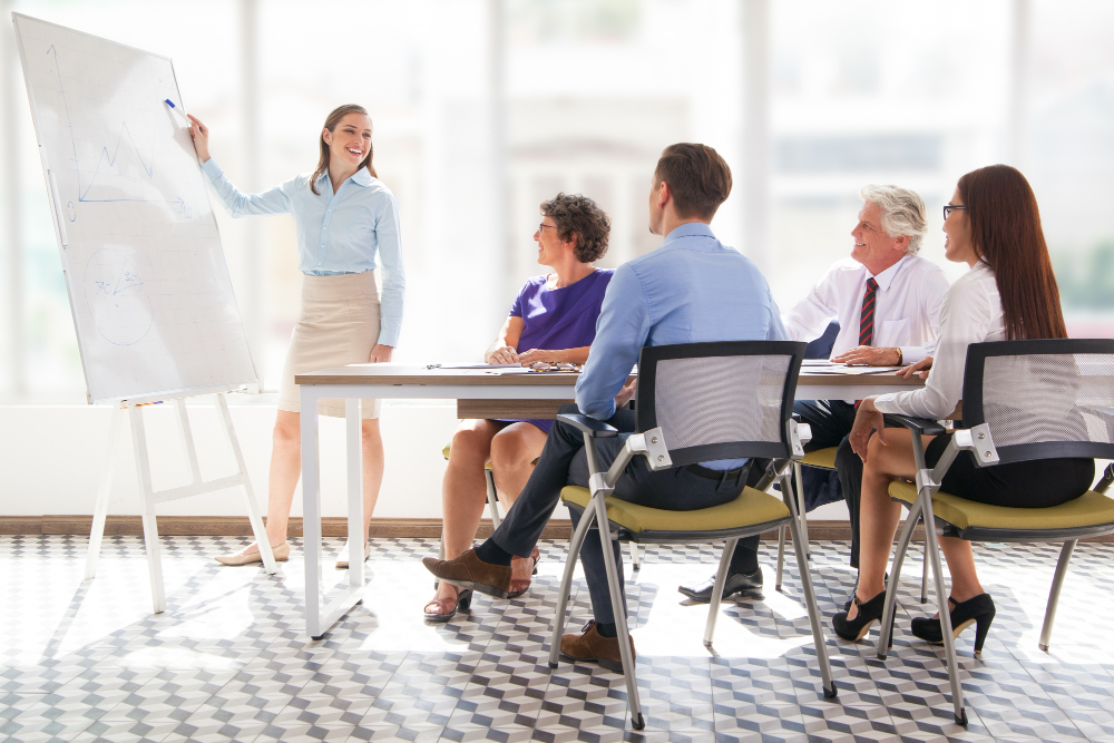 meeting-mature-office-showing-presenter